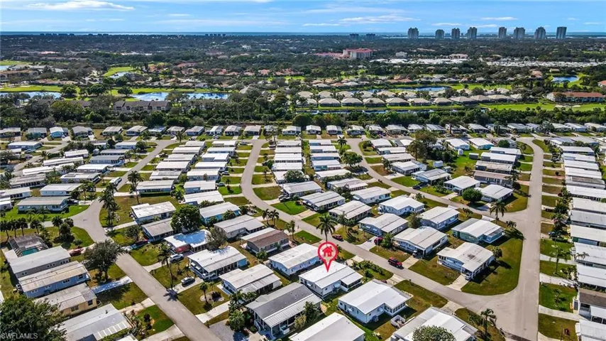 Drone / aerial view with a view of city and a residential view
