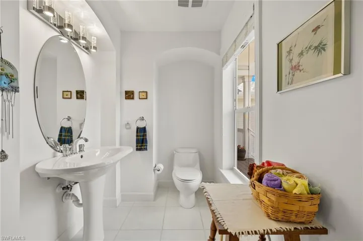 Bathroom featuring tile patterned floors and toilet