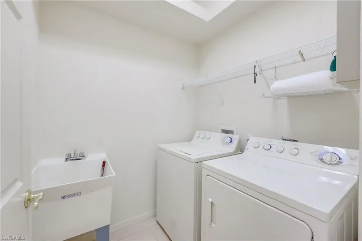 Laundry room with mud sink
