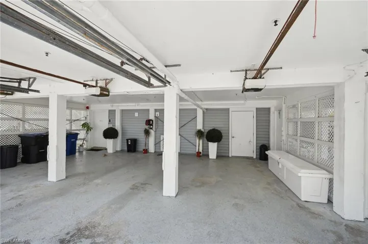 Garage featuring a garage door opener