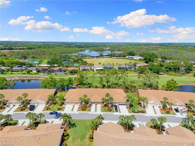 Bird's eye view with a residential view, view of golf course, and a water view