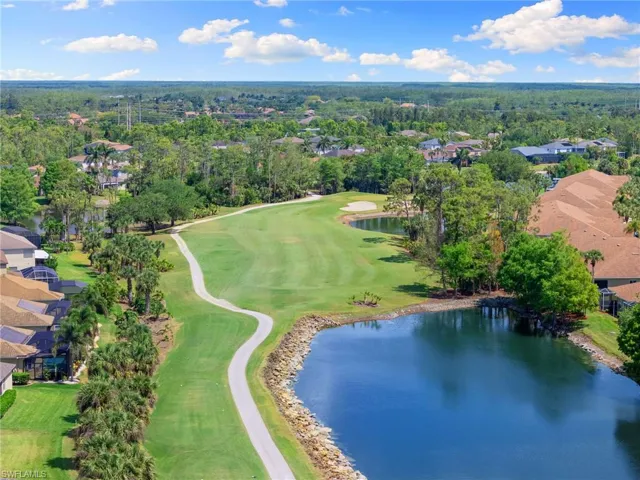 Bird's eye view with a water view, a residential view, and view of golf course