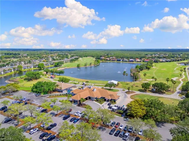 Birds eye view of property featuring a residential view, view of golf course, and a water view