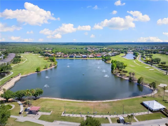 Bird's eye view featuring golf course view, a residential view, and a water view
