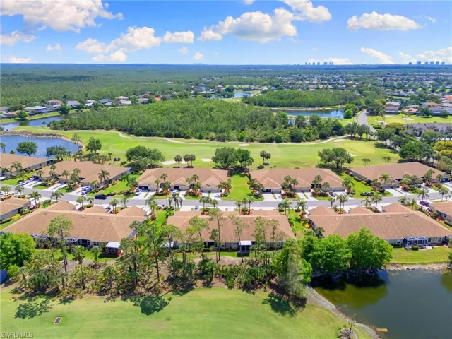 Bird's eye view with a water view, a residential view, and golf course view