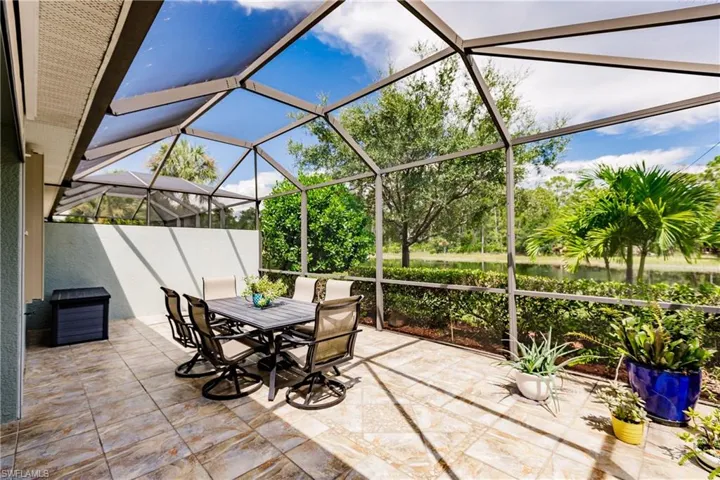 LAKE & PRESERVE VIEW WITH A PRIVACY WALL TO THE LEFT.  BEAUTIFUL LIKE A PICTURE!