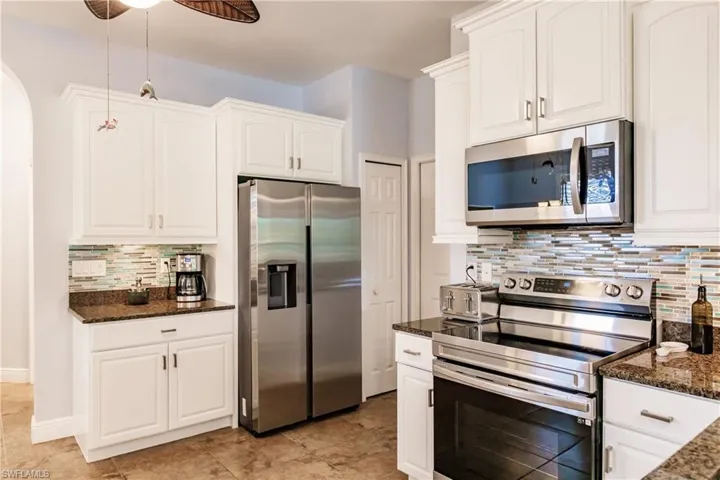 GREAT VIEW OF JUST HOW BEAUTIFUL THIS KITCHEN TRULY IS! MUST BE SEEN IN PERSON TO TRULY APPRECIATE IT'S BEAUTY!