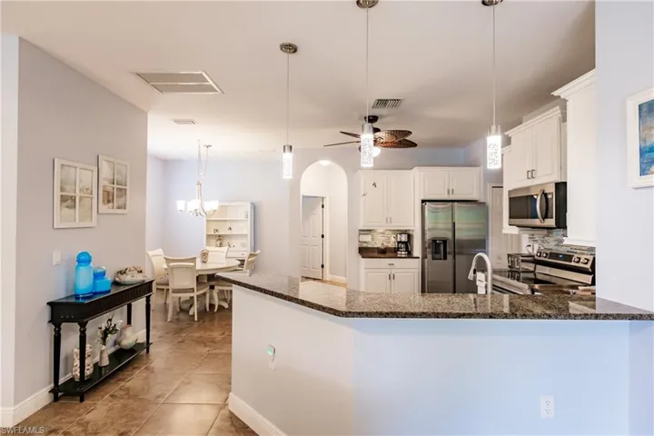 UPDATED LIGHTING IN THIS RECENTLY BEAUTIFULLY PAINTED HOME! SHOWS LIKE A MODEL HOME!