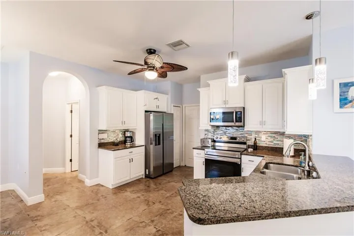 ALL NEW STAINLESS STEEL SAMSUNG APPLIANCES & NEW 42" WHITE "SHAKER" CABINETS