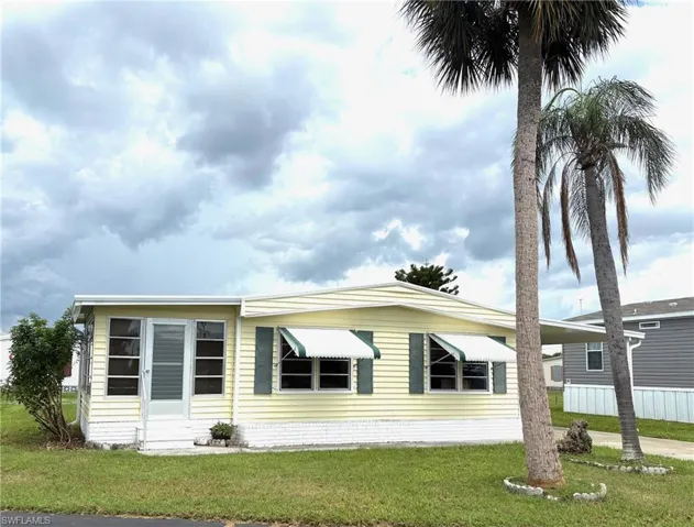 PRICED RIGHT & READY TO SELL! Storm shutters provide protection and energy savings.