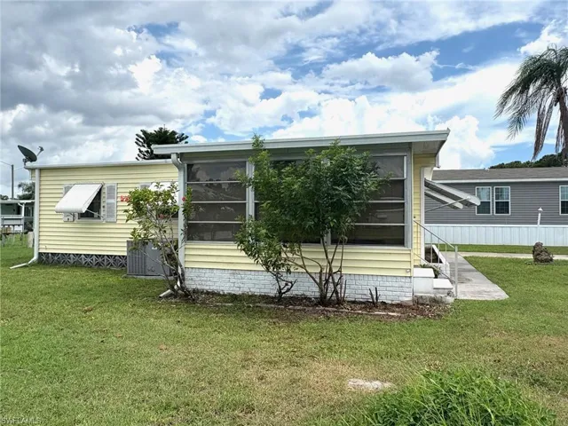 View of the Florida room from the side yard.