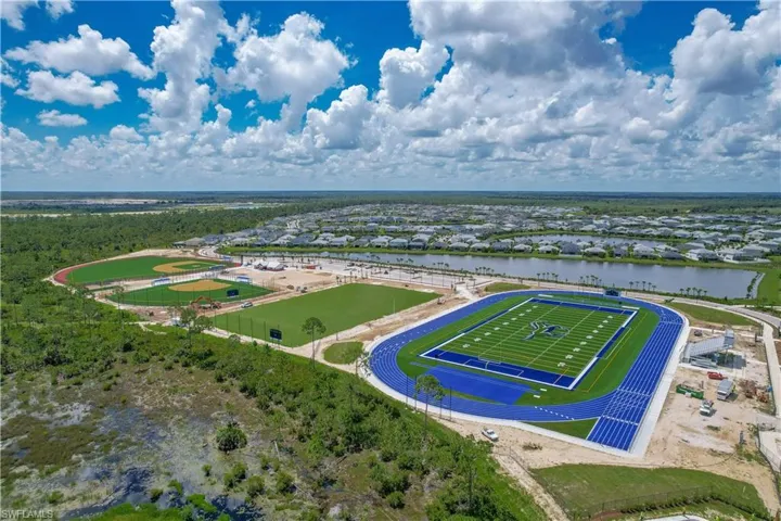 Aerial view of residential area with a nearby body of water