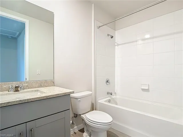 Full bath with tub / shower combination and vanity