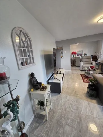 Living room featuring lofted ceiling