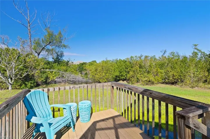 Wooden terrace with a lawn