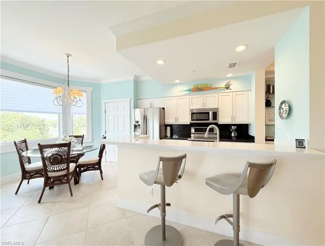 Kitchen with Breakfast Bar and Eat In
