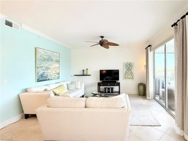 Living Room with Sliders to Back Screen Lanai