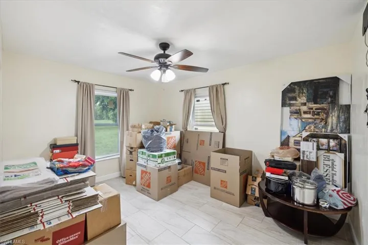 Storage room featuring ceiling fan