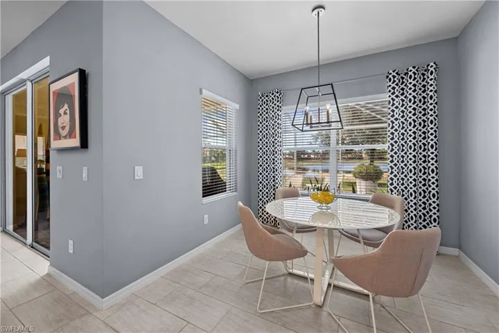 Breakfast area featuring an inviting chandelier