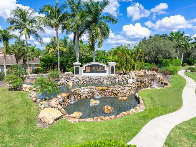 Surrounding community featuring a small pond