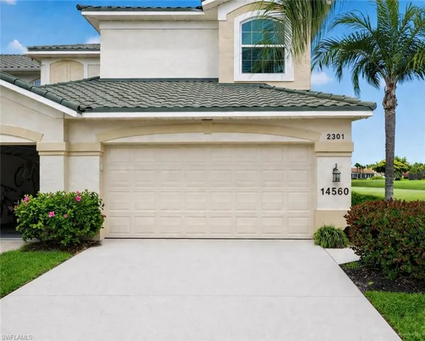 Two car garage and parking for two cars in driveway
