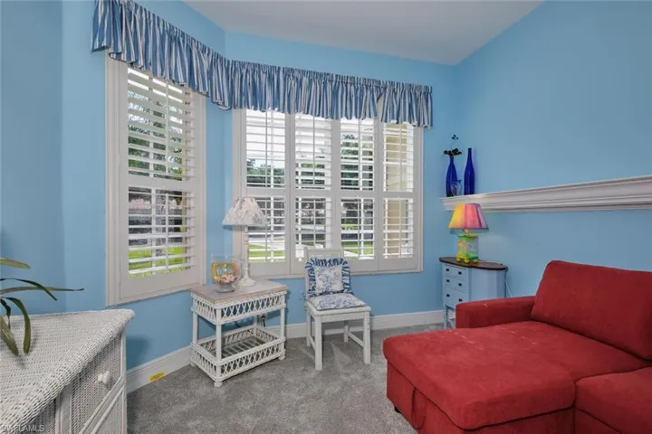 Living area with carpet flooring