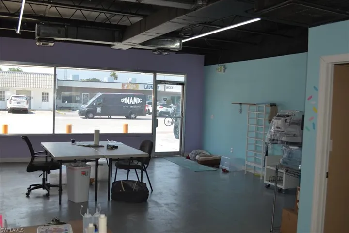 Dining room with a healthy amount of sunlight and concrete floors