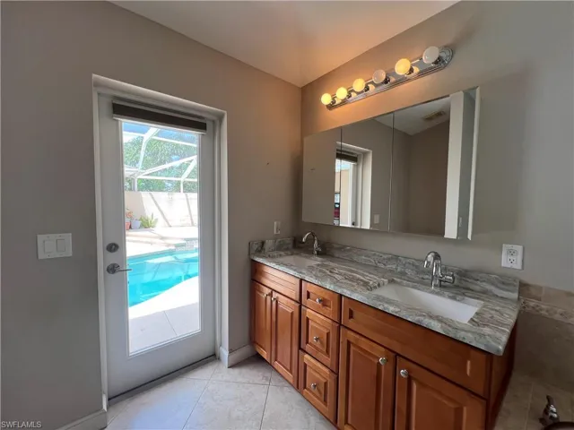 Two Pool Baths!  Both Master bath and casita bath open into pool area.