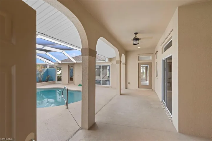 Entry open to a spacious lanai and beautiful private pool.