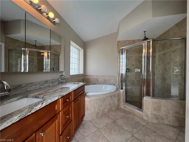 Spa-like master bath with separate soaking tub.