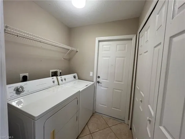 Nice laundry room between garage and kitchen.