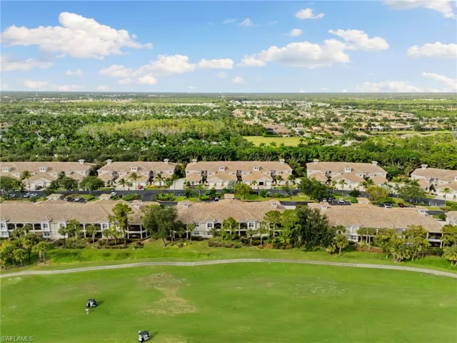 Aerial view of residential area with a local golf course