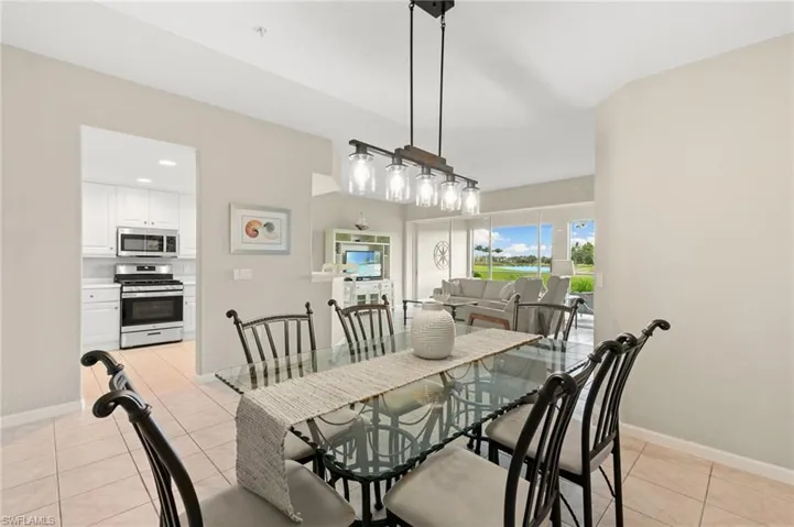 Dining room featuring light tile patterned floors