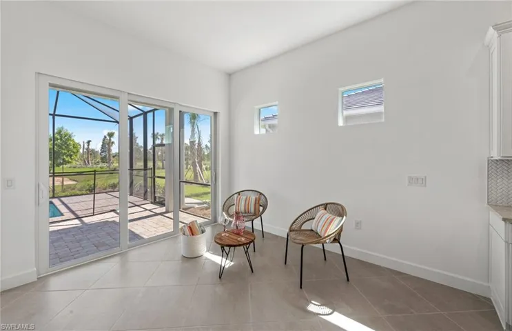 Sitting room with light tile floors