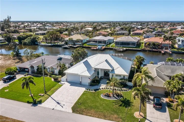 Bird's eye view featuring a water view and a residential view