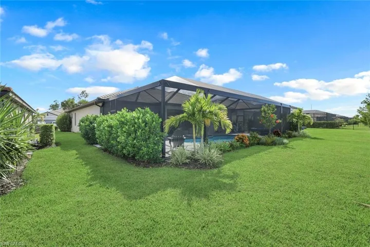 View of yard featuring a lanai