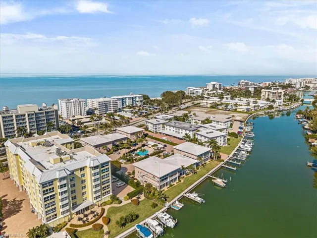 View of urban area with a nearby body of water and apartment complex