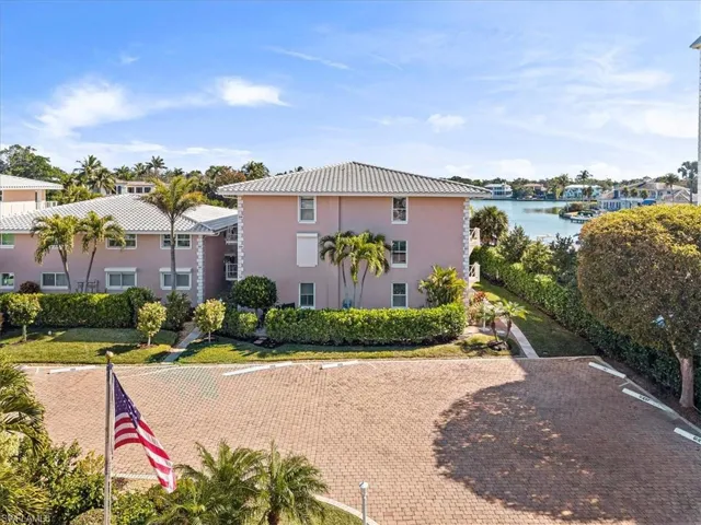 Surrounding community featuring a water view