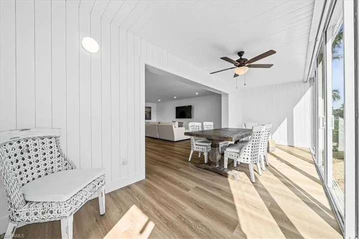 Dining space featuring light wood finished floors and ceiling fan