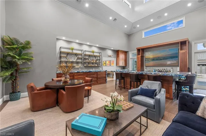 Custom-built bar with exotic, illuminated countertops