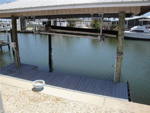 10,000 lift with solid truss metal roof. Electricity and water.