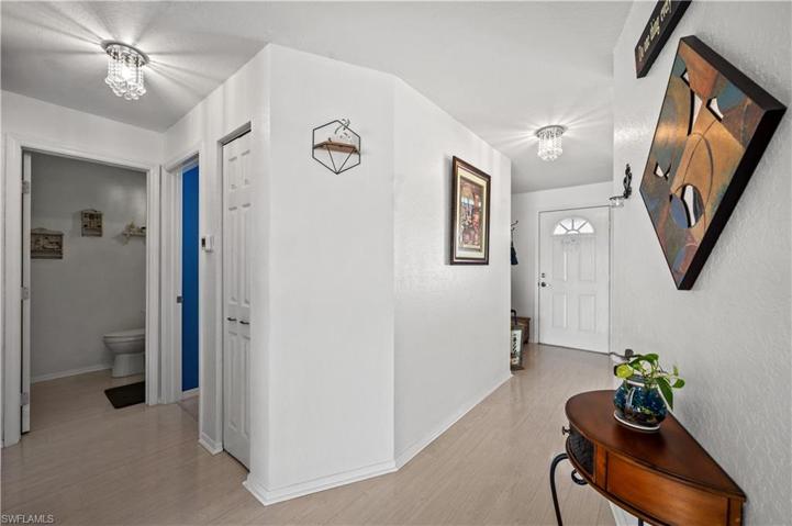 Entryway and Hallway leading to 2nd bed & bath