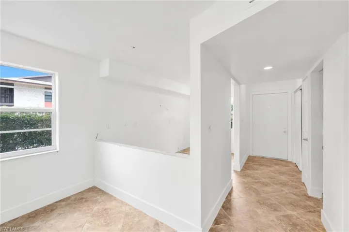 Shows Entrance Hall, Dining Area and Kitchen