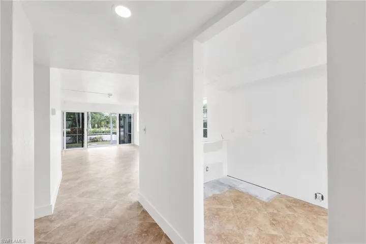 Entrance Shows Kitchen through to Lanai