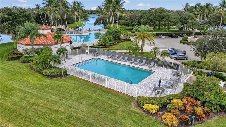 Community pool with a patio area