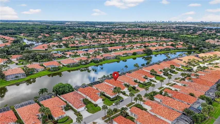 Drone / aerial view of home and neighborhood
