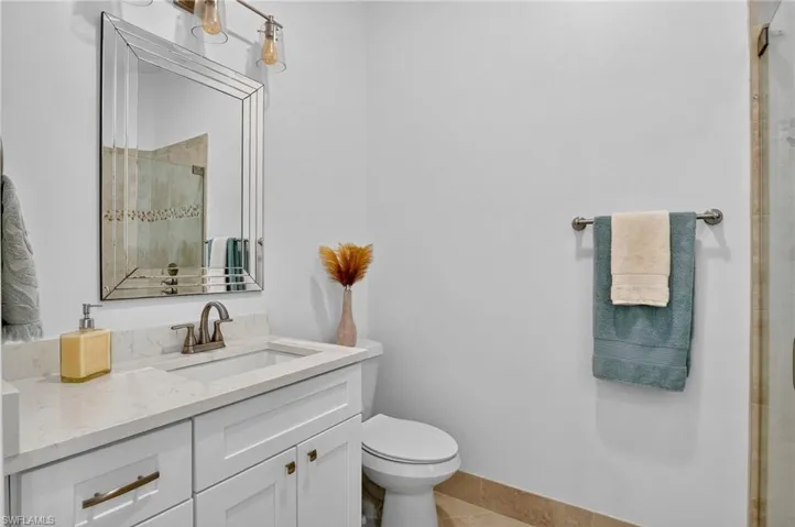 Primary Bathroom with 2nd side with vanity and walk in shower