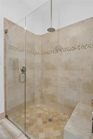 Full bathroom featuring a walk in shower