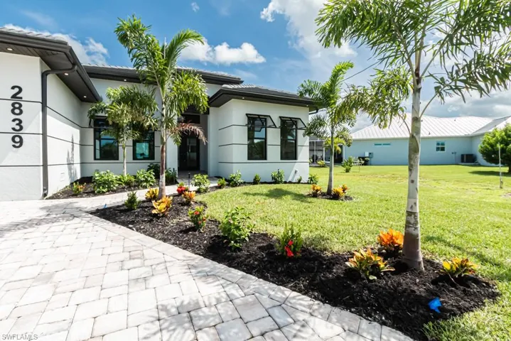 View of front of house featuring a front lawn