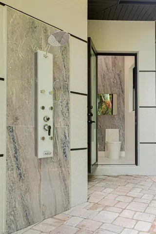 Bathroom with a shower and toilet